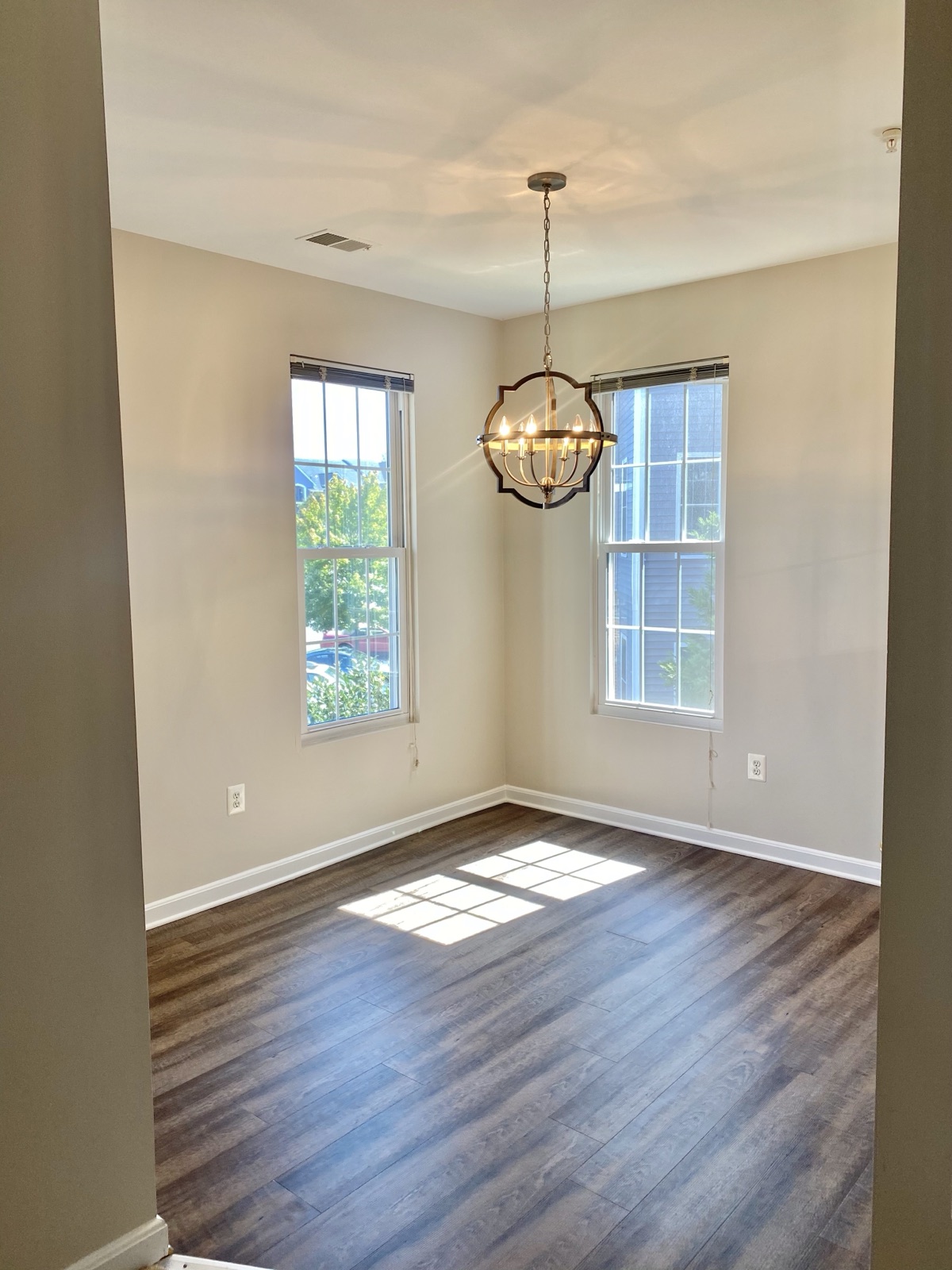 Finished interior painting, trim, lighting, and flooring project